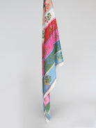 Bright cotton scarf with mixed floral motifs and vibrant vertical stripes