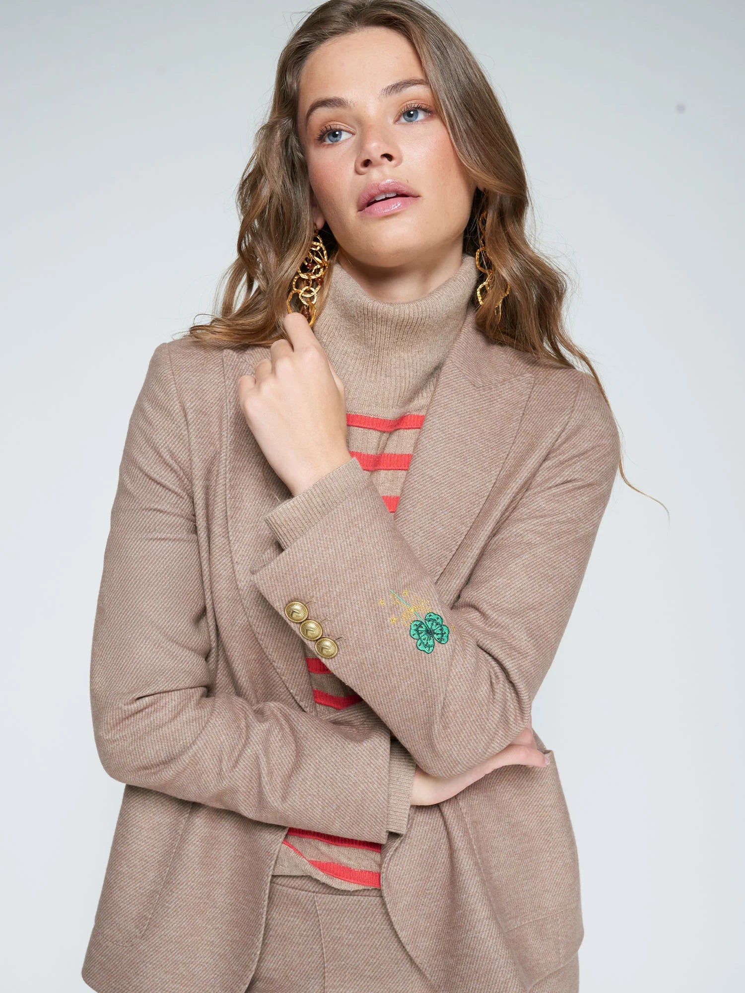 Vilagallo Camel Tailored Blazer — sleeve detail with gold buttons and clover embroidery