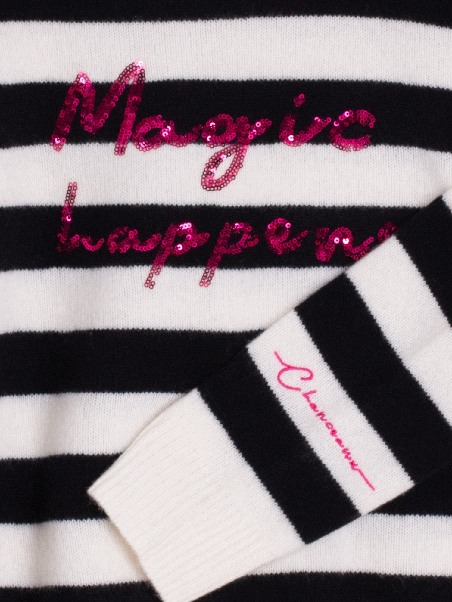 Close-up of pink sequin embroidery on Vilagallo Magic Happens knit