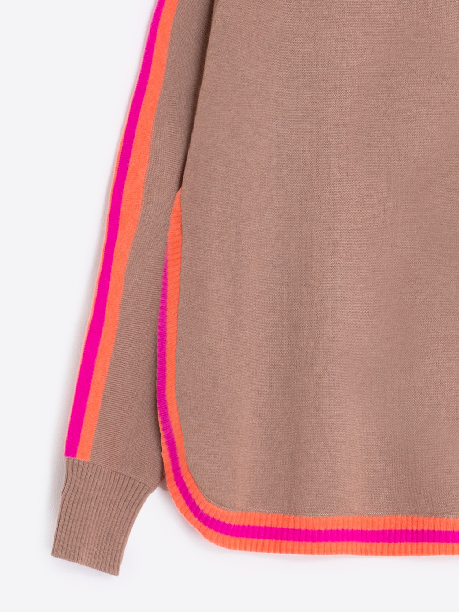 Women’s camel wool jumper with fluro pink and orange ribbed cuffs.
