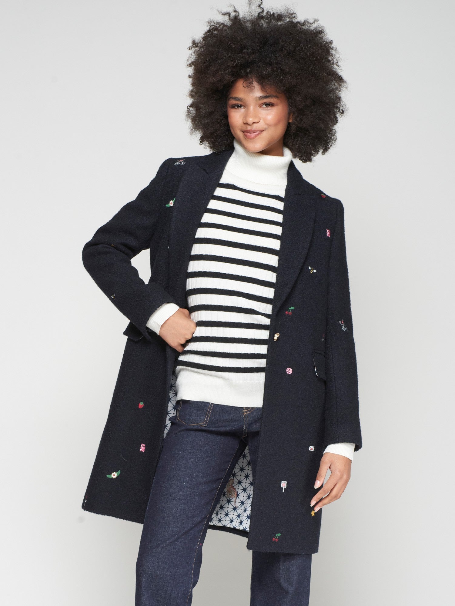 Vilagallo navy long wool coat with embroidered bees and cherries.