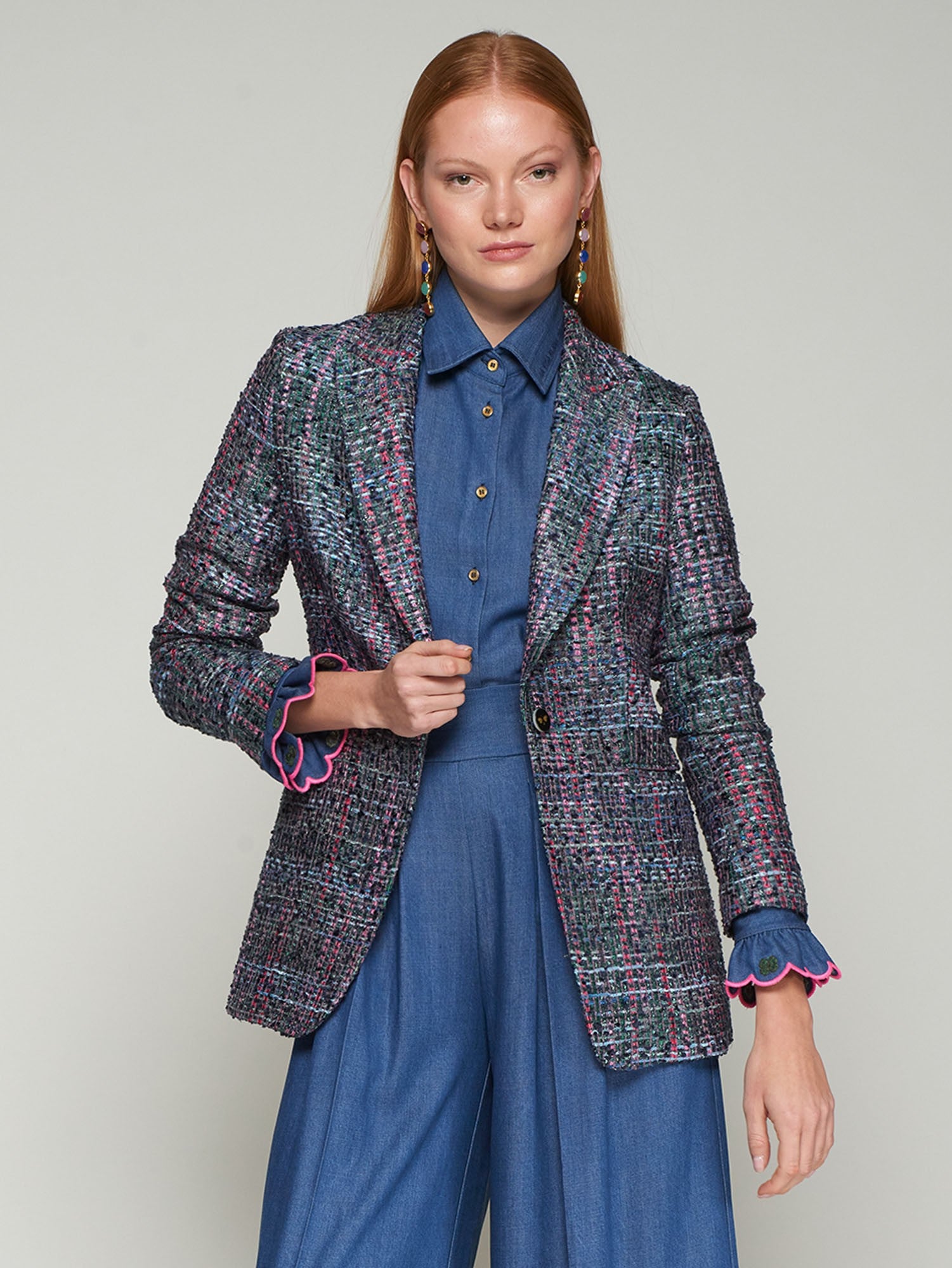 Full-length shot of Vilagallo Sophia blazer styled with wide-leg blue trousers