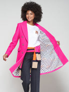 Detail of Vilagallo coat’s celestial star and leopard print lining.