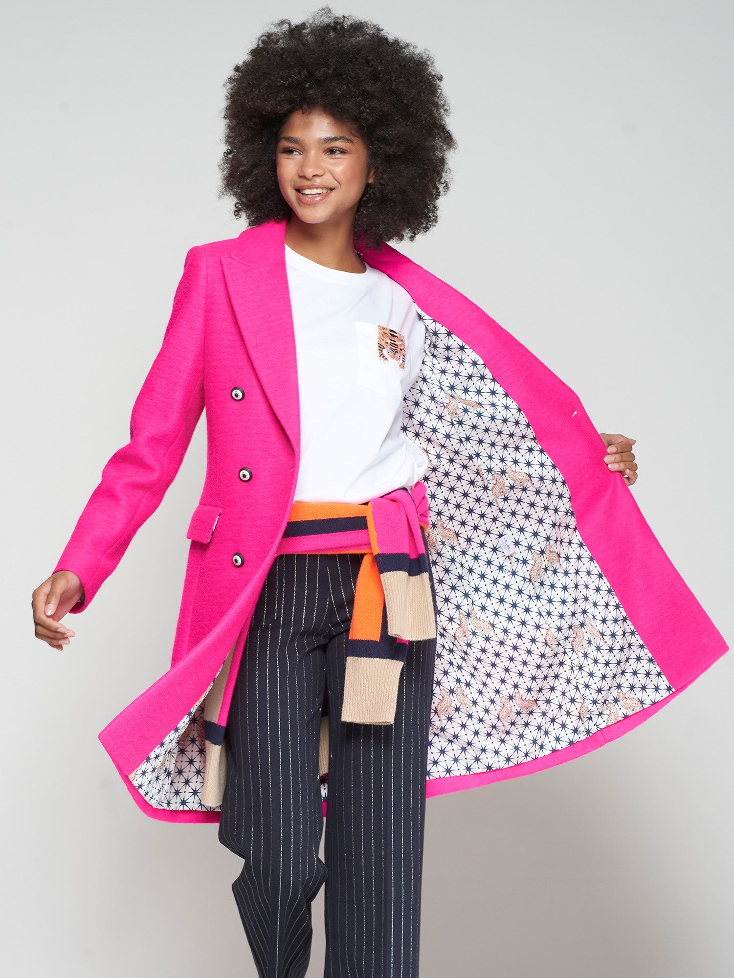 Detail of Vilagallo coat’s celestial star and leopard print lining.