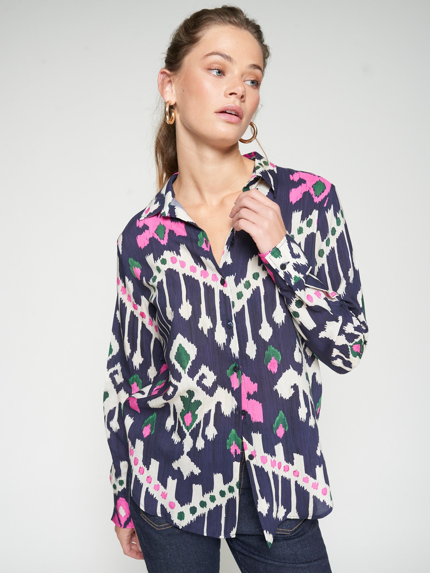 Vilagallo navy blouse with fuchsia, green, and ivory ikat print