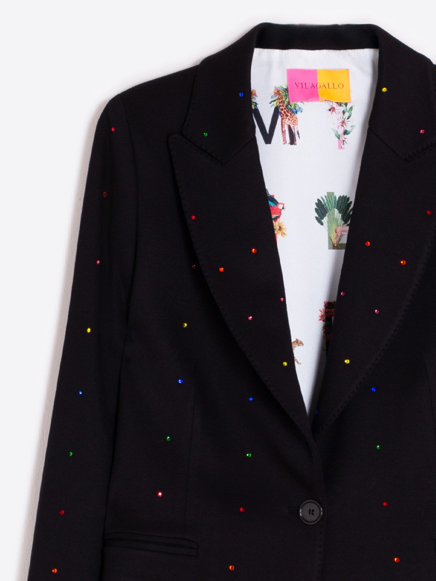 Tropical alphabet print lining inside Vilagallo black embellished blazer
