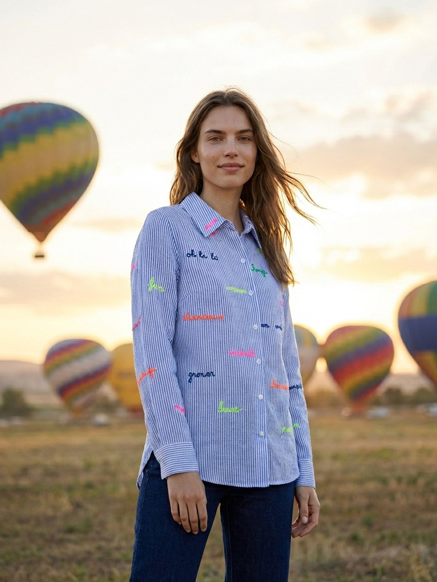 Vilagallo blue word embroidery striped shirt styled outdoors with jeans