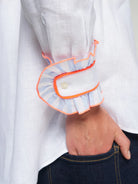     Vilagallo white shirt striped ruffle cuff with neon orange trim detail