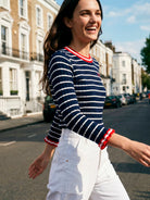 Vilagallo navy striped ribbed jumper with red neckline and ruffle cuff detail side view