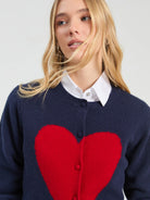 Vilagallo navy wool cardigan with oversized red intarsia heart – close model view
