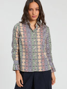 Vilagallo geometric print long sleeve shirt styled with navy trousers
