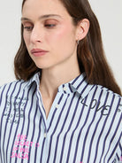 Vilagallo striped graphic cotton shirt close-up showing colourful graffiti print